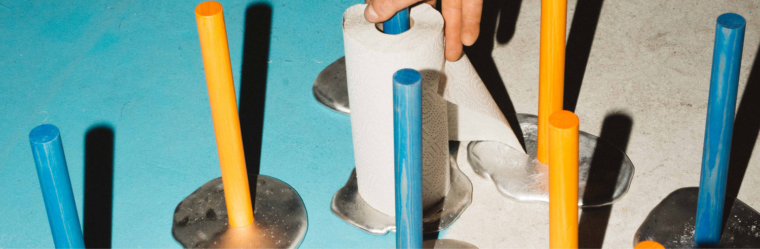 An editorial image from behind the scenes of Spill Kitchen Roll Holder, a Hem X limited edition piece.