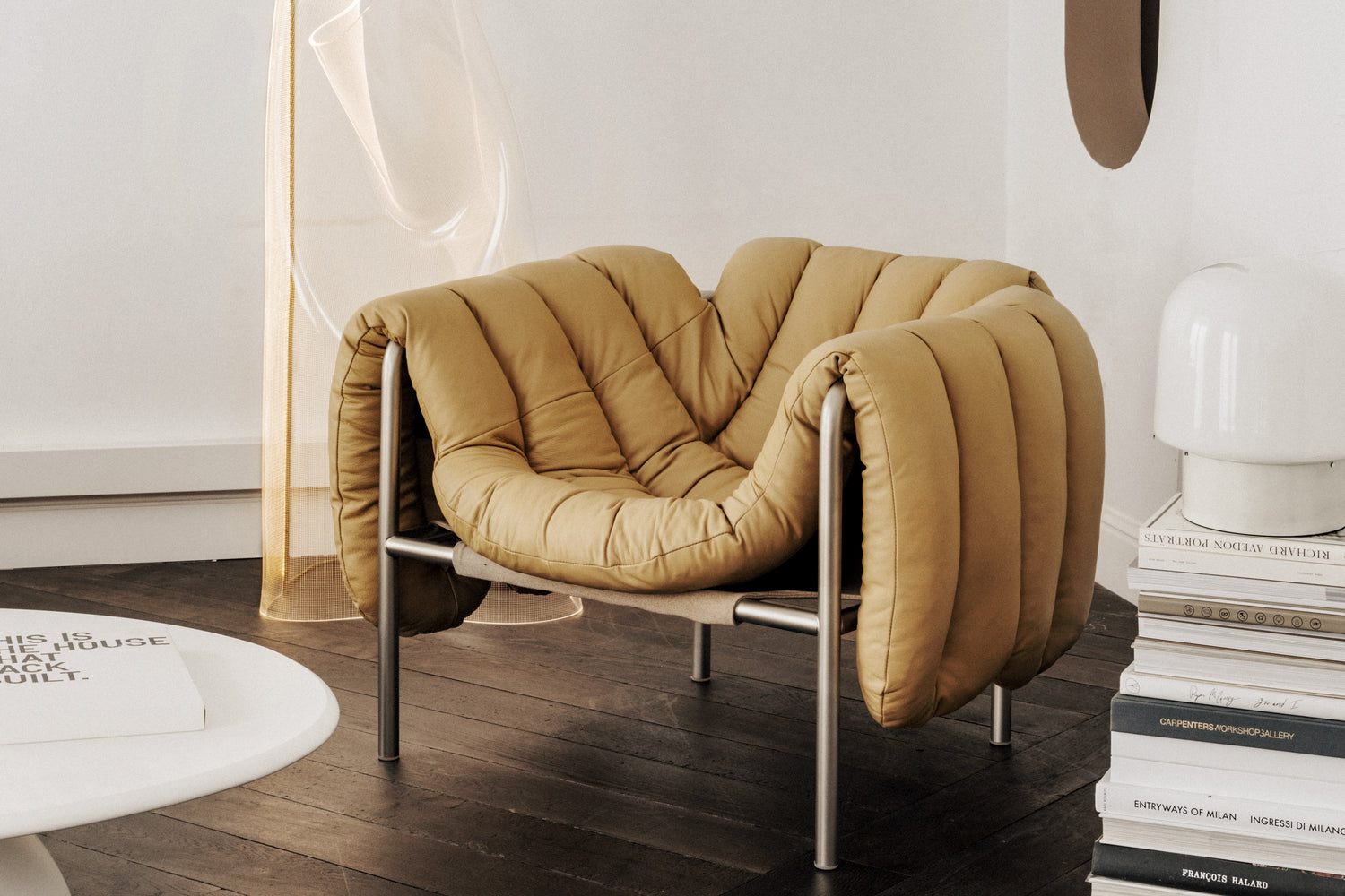 User generated content of a Puffy Lounge Chair in Sand Soft Leather and Stainless Steel Legs.